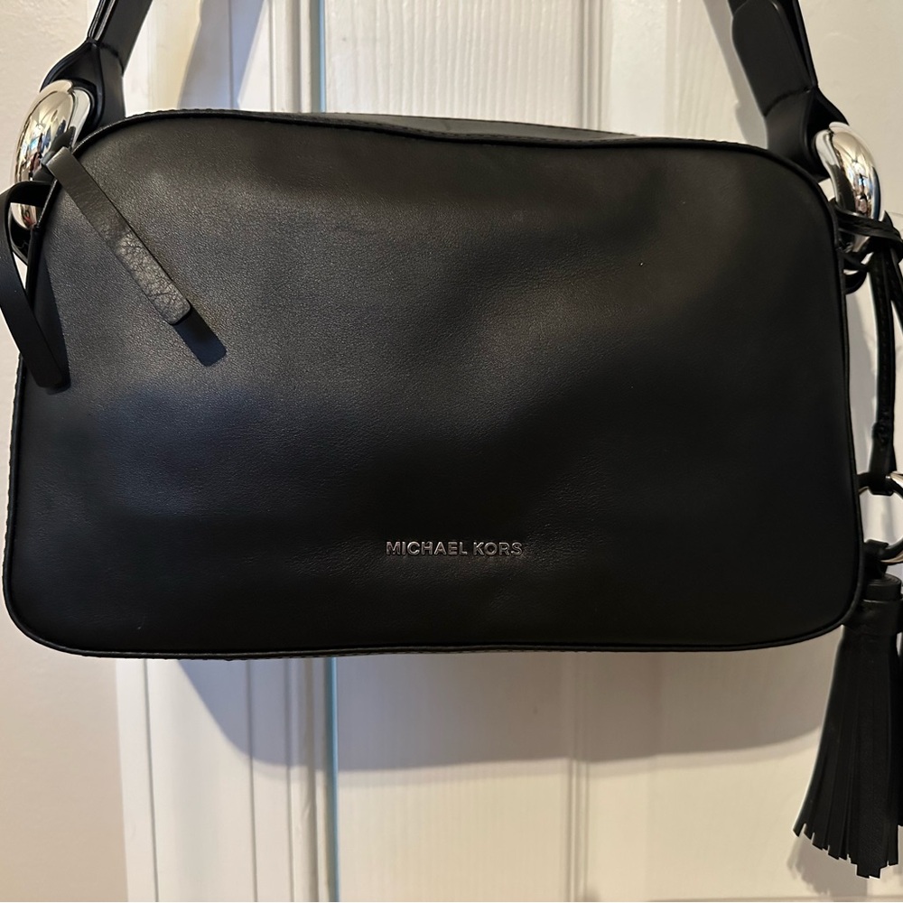 Michael Kors shoulder bag.  Black with silver details.  Never used.